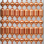 Copper or copper plated Ball-Bar metal ball chain hanging vertically