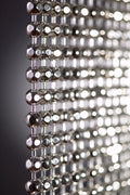 Nickel Plated or Aluminum or silver colored Faceted metal ball chain hanging vertically