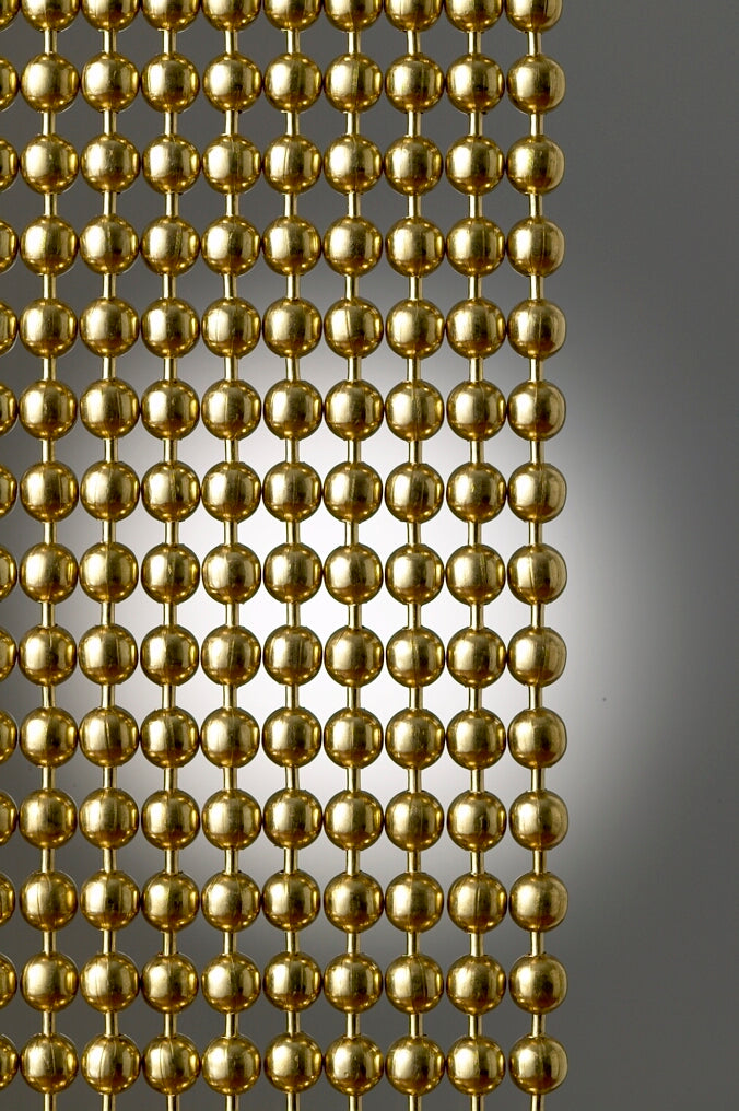 Yellow Brass Round metal ball chain hanging vertically
